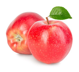 Two red apples with green leaves isolated on a white background.