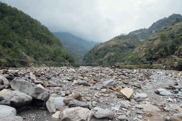Trail on the Annapurna Base Camp Trek in tropical Rain forest Nepal.