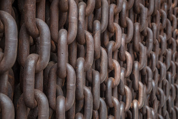 Background made of rusty iron chains.
