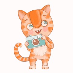 A cute ginger tabby cat is holding a camera in his hands. Kitten photographer