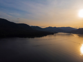 Sunset on Teletskoye lake in Altai mountains, Siberia, Russia. Drone shot.