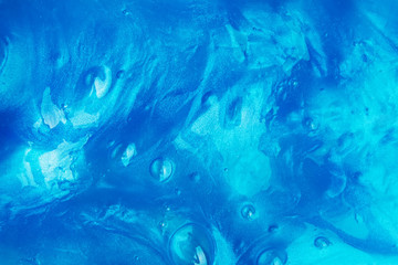 Abstract blue background with texture of slime or other liquid
