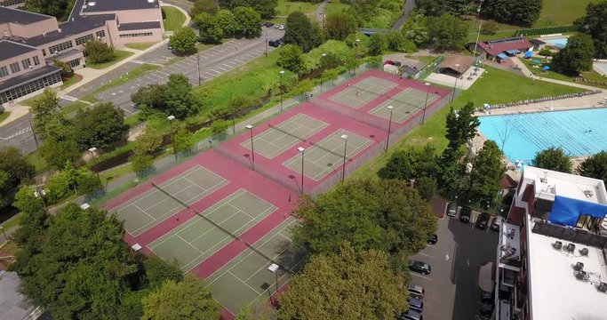 Drone moving towards tennis courts