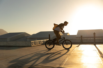 BMX rider on a rooftop