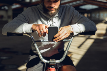 BMX rider in an empty warehouse