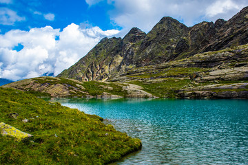 Naklejka na ściany i meble small alpine lake in Tyrol six