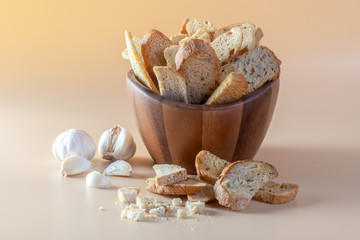 Garlic bread on orange background