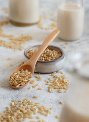 Brown rice in a wooden spoon