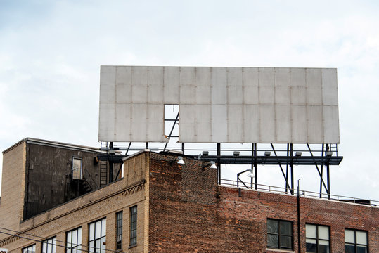 Old building with a worn billboard