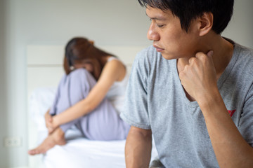 Fototapeta premium Couples are bored, stressed, upset and irritated after quarreling. Family crisis and relationship problems that come to an end
