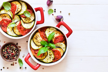 Village dinner - baked vegetables with olive oil and spices. Ratatouille.
