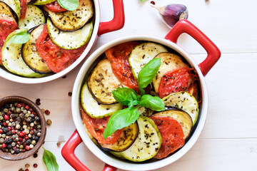 Village dinner - baked vegetables with olive oil and spices. Ratatouille.