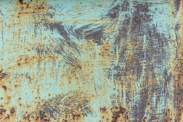 texture of rusty painted metal. several layers of paint. corrosion of metal