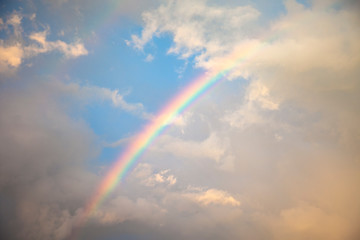 Beautiful Rainbow in the Cloudy Sky