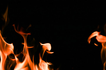 Fototapeta premium Fire flames on black background