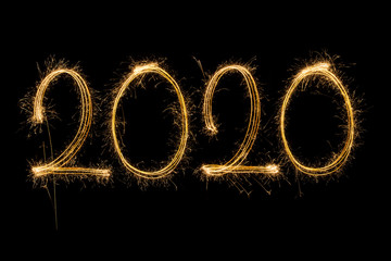 Obraz na płótnie Canvas Happy New Year 2020. Creative text Happy New Year 2020 written sparkling sparklers isolated on black background for design，Merry Christmas