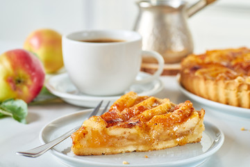 Breakfast with homemade french apple tart and coffee