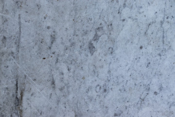 Fototapeta premium Background in the form of a marbled surface of dirty light color with a characteristic texture