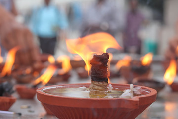 Naklejka premium Earthen Lamp Prayers offering to God in Temple