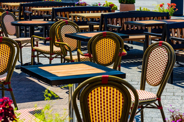 Chairs and tables in a cozy street cafe
