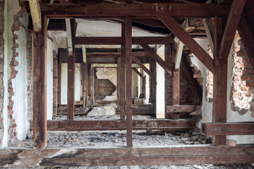 Fototapeta na wymiar Roof Wooden Columns in Old Abandoned Building