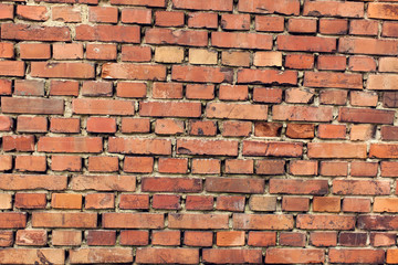 Obraz premium Red bricks background. A part of wall of the building