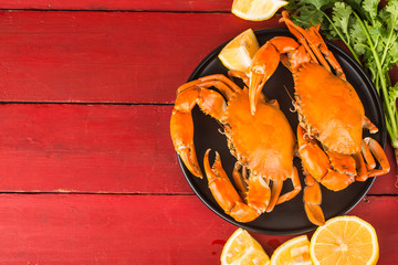 The ripe crabs on the black plate,