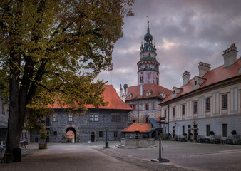 Fototapeta na wymiar View of the beautiful tower of Cesky Krumlov Castle at the morning light. Famous small town in Czech Republic.