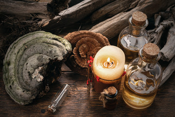 Magic potion bottles on a wizard table. Herbal medicine with dried ingredients on the table...