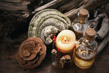 Magic potion bottles on a wizard table. Herbal medicine with dried ingredients on the table...