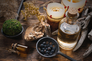 Magic potion bottles on a wizard table. Herbal medicine with dried ingredients on the table...