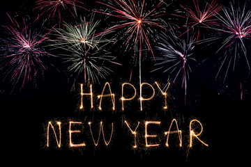 Happy New Year 2020. Creative text Happy New Year 2020 written sparkling sparklers isolated on...