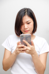 Fototapeta premium Business asian white shirt women using text on smartphone