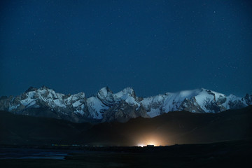 Mountain valley at night sky