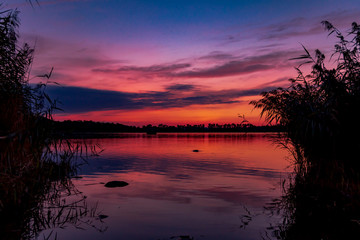 Fototapeta na wymiar Pond Rezabinec after sunset sunshine, Kestrany, Czech Republic