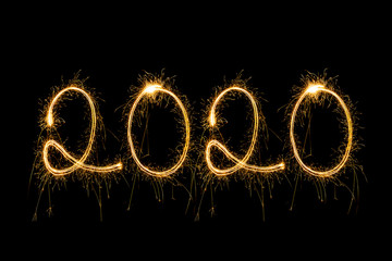 Happy New Year 2020. Creative text Happy New Year 2020 written sparkling sparklers isolated on black background for design，Merry Christmas