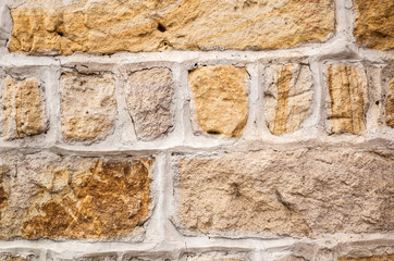 aged yellow brick wall