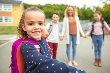 group of kids on the school background having fun