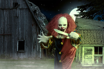 An eerie clown with a knife in hand in front of a scary scene