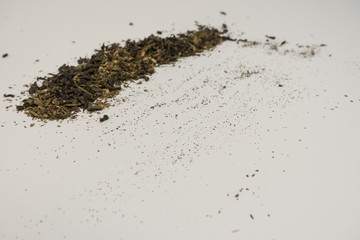 Classic green rosehip tea on a white background