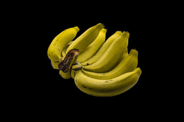 : Yellow bananas on a black background with  clipping path