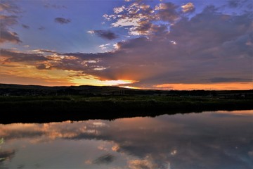 a sunrise at the lake