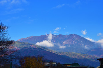Fototapeta na wymiar Bhutan eastern mountains from Thimphu city in a morning
