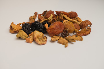 Tasty photo of dried fruits on a white background