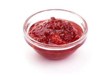 Lingonberry jam in a bowl, isolated on white background