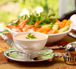 Spicy Tomato Dip in bowl in table setting