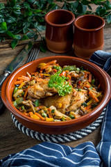 Fried chicken fillet with vegetables.