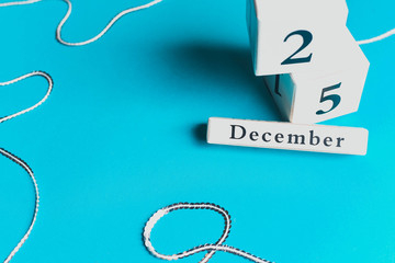 Cubes with a festive date on December 25th.