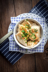Dumplings with meat, onion and bacon.