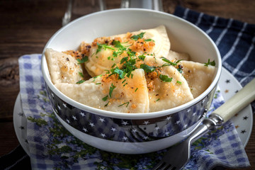 Dumplings with meat, onion and bacon.